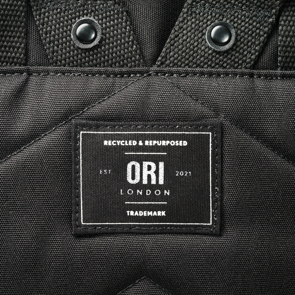 All Black Canfield Roll Top Backpack in Ash