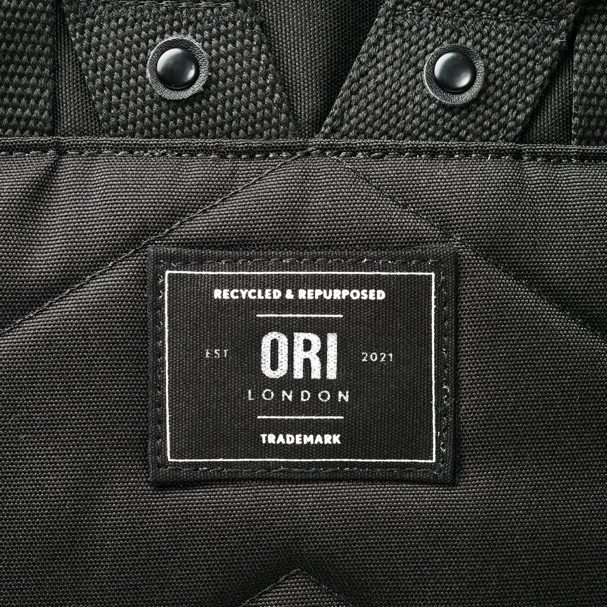 All Black Canfield Roll Top Backpack in Ash