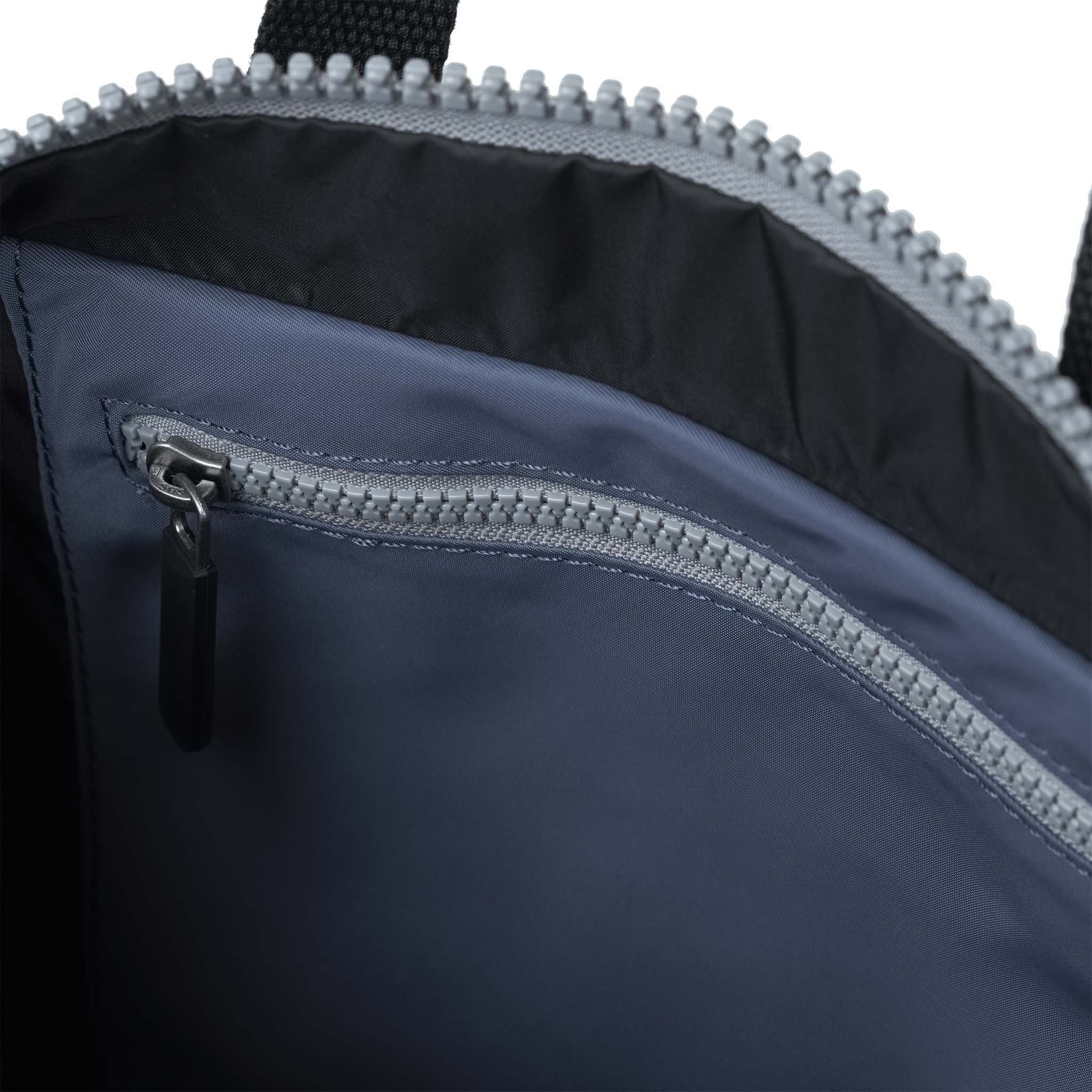 Black Label Canfield Roll Top Backpack in Burnt Blue