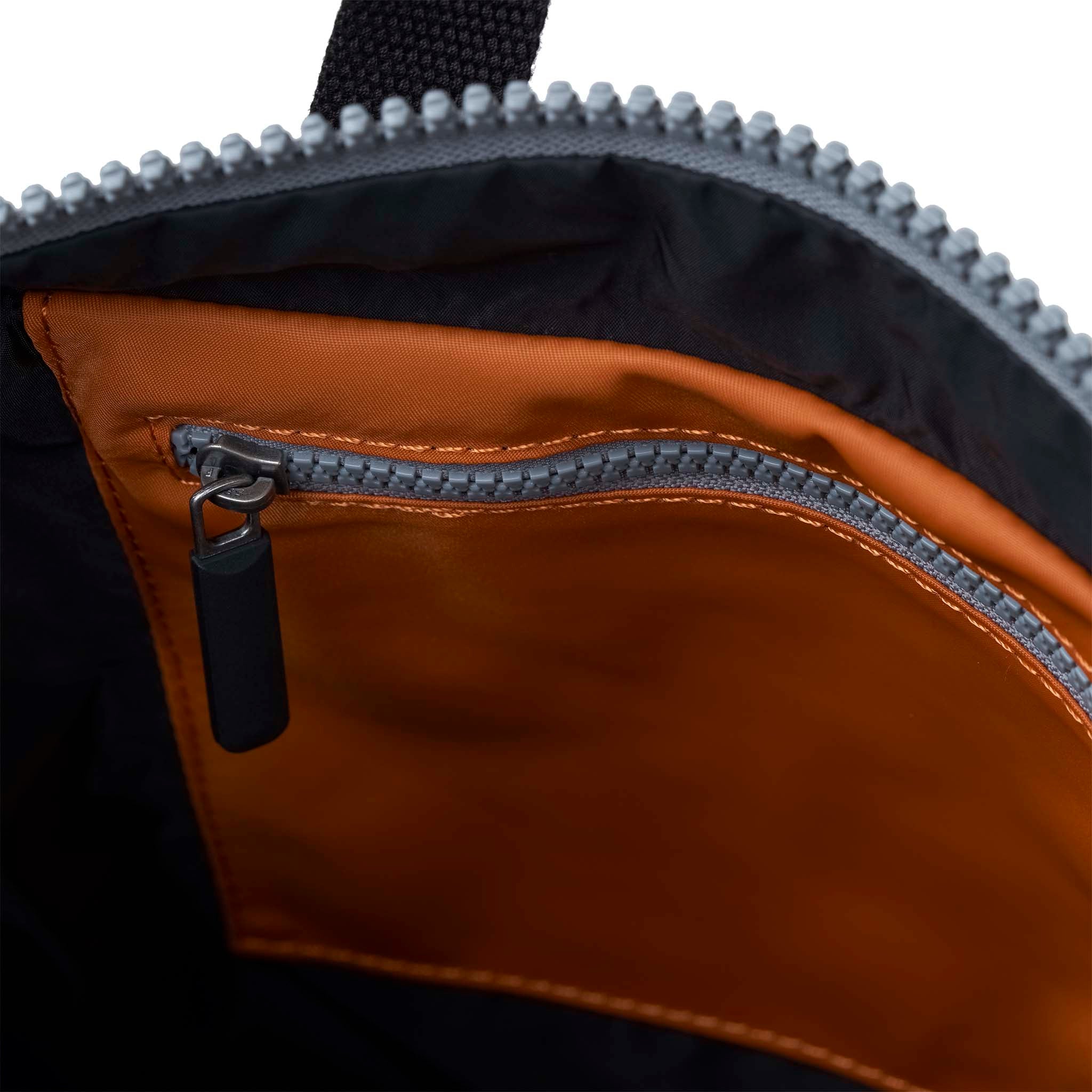 Black Label Canfield Roll Top Backpack in Burnt Orange