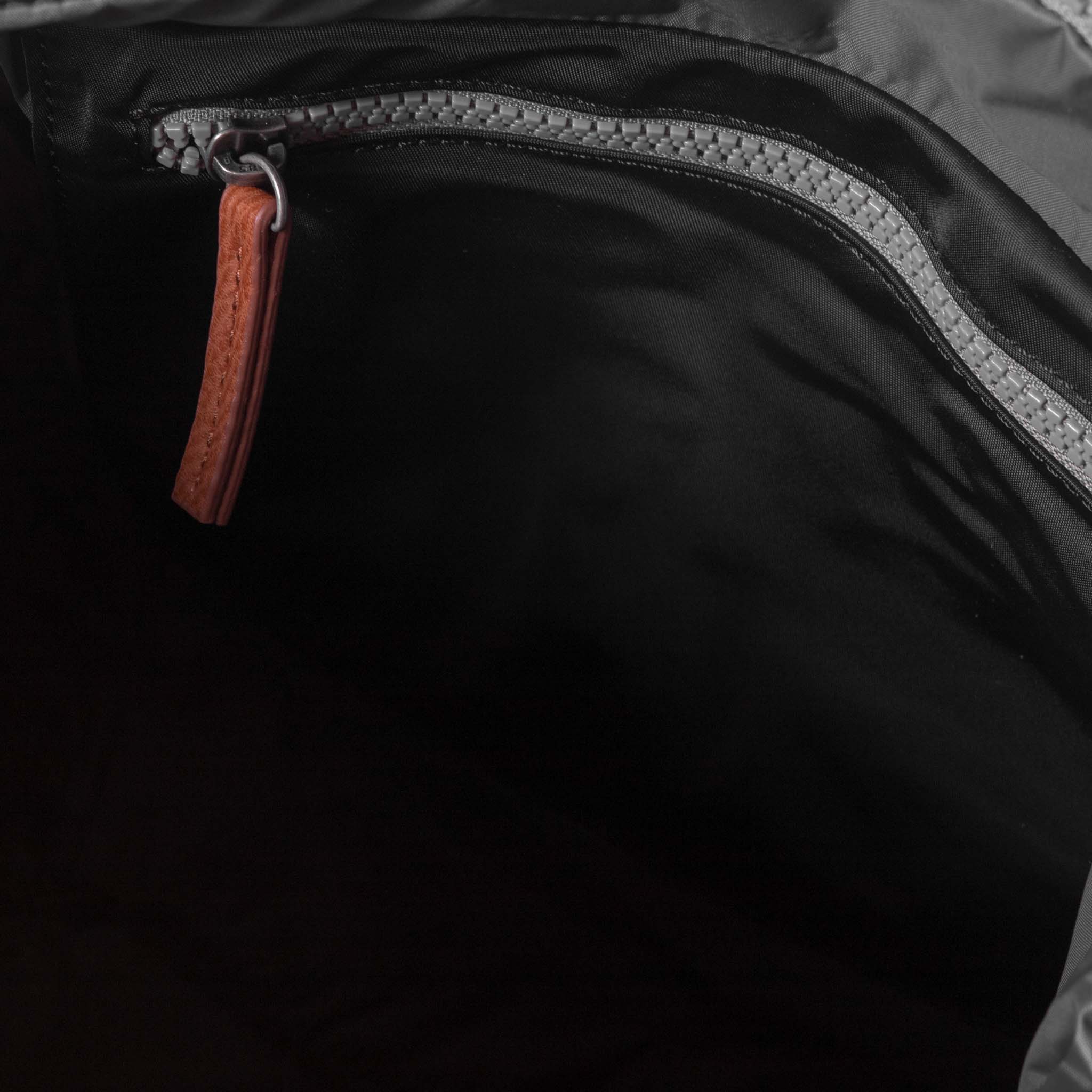 Canfield Roll Top Backpack in Black